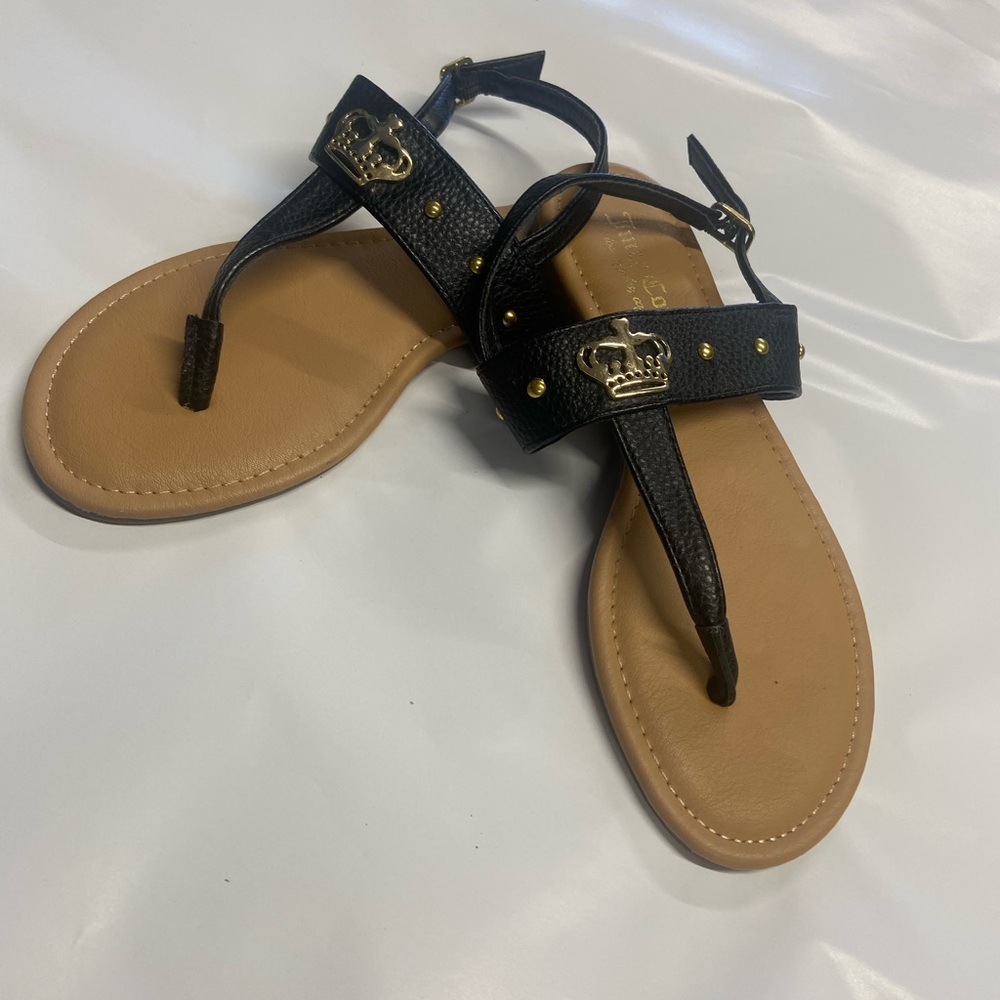 Juicy Couture Black and Gold Sandals with T-Strap Design